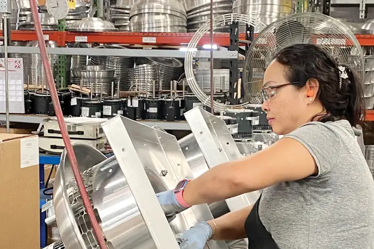 S&P USA employee assembling ventilation units